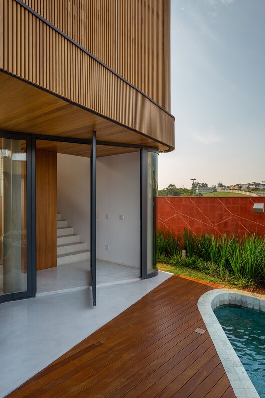 Mandacaru House / Arquitetura Nacional - Интерьерная фотография, окна, фасад