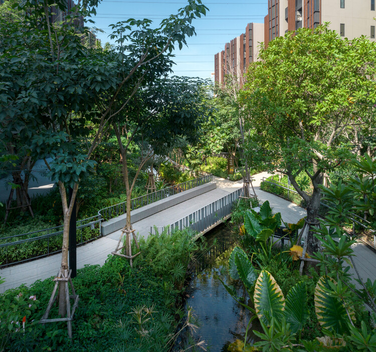 Jin Wellbeing County / Shma Company Limited - экстерьерная фотография, набережная, окна, сад