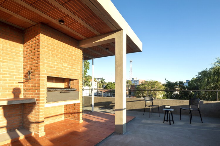 Triplex Yvapovõ / Biocons Arquitectos - Интерьерная фотография, Балка, Палуба, Патио
