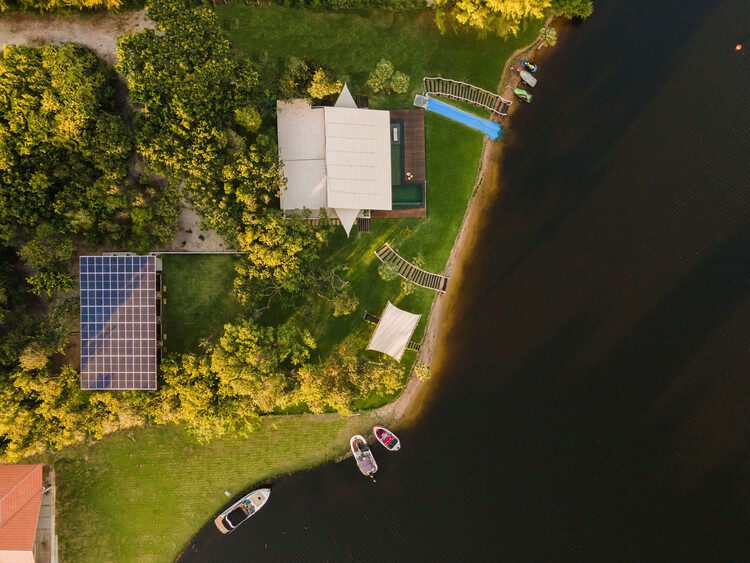Lagoa House / Camila Mourão Arquitetura — фотография экстерьера, окна