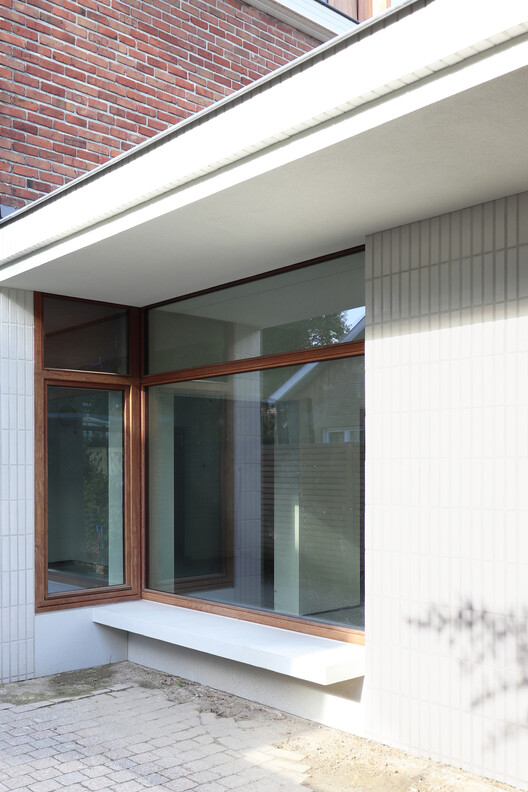 Дом SC / Wim Heylen Architect - Фотография интерьера, окна, двери, кирпич, фасад