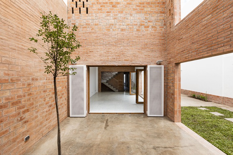 Casa Aguas Buenas / Ignacio Szulman arquitecto - Фотография интерьера, кирпич, фасад