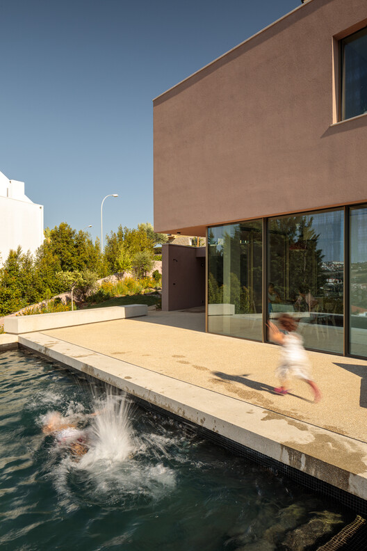 Дом в Кашиасе / João Caetano Arquitetura - Фотография Экстерьера, Окна