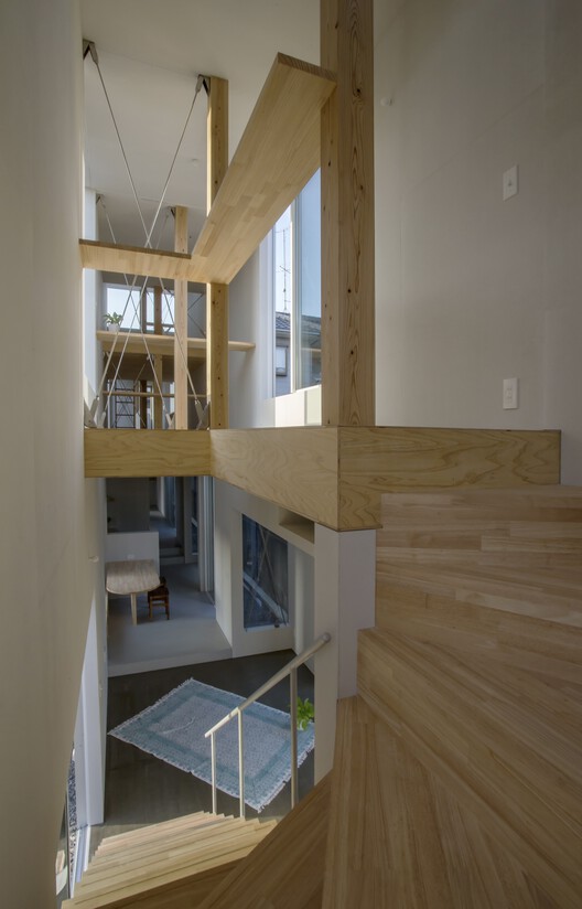 Дом KJ / 1-1 Architects - Фотография интерьера, окна, перила