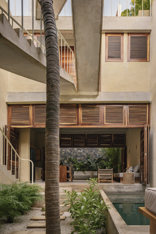 Palmeras Houses / PRODUCTORA - Фотография интерьера, дерево, брус