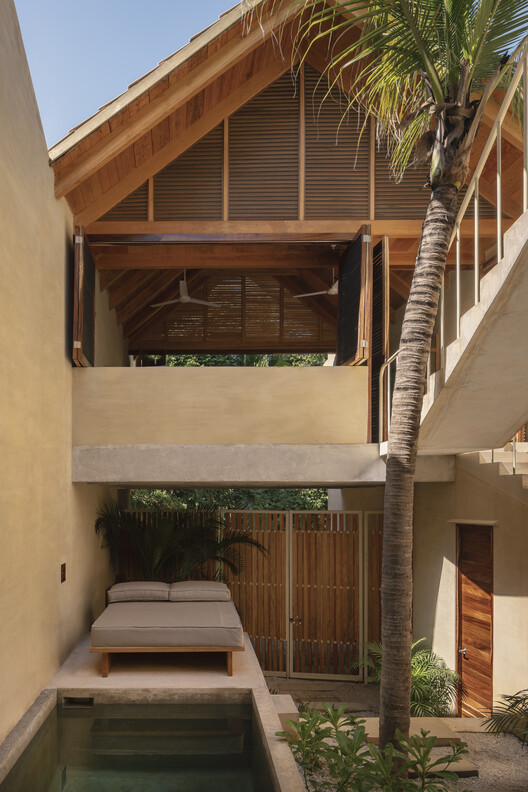 Palmeras Houses / PRODUCTORA - Фотография интерьера, дерево