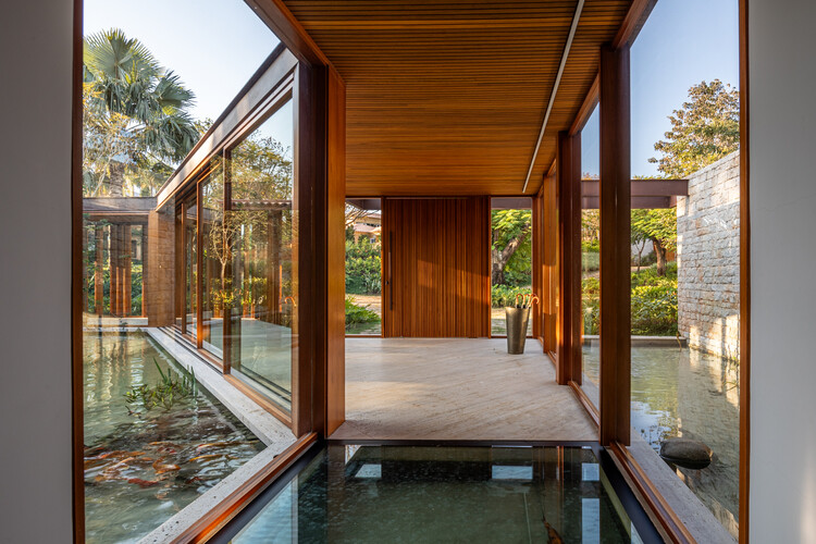 Дом у озера / Gilda Meirelles Arquitetura — изображение 10 из 27