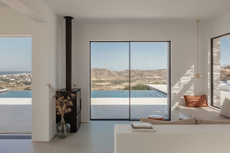 La Natura Villas / Plinthos Architects + Стефания Нтину Архитектор - Фотография интерьера, стул