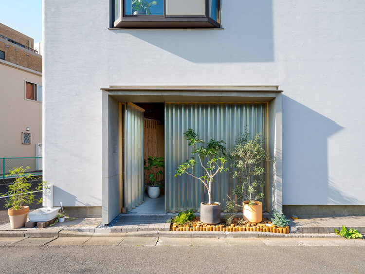 Дом в Кацусике / Yo Irie Architects — фотография экстерьера, бетон