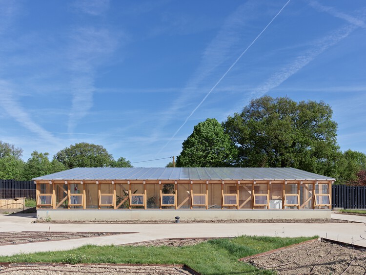 Центр Le Potager Extraordinaire / Guinée et Potin Architects - изображение 3 из 21