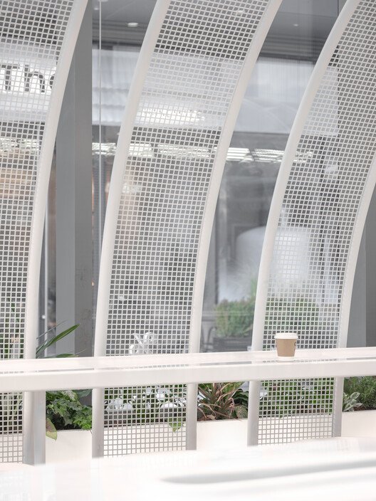 % Arabica Shanghai Expo World / Nguyen Khai Architects & Associates - изображение 12 из 18