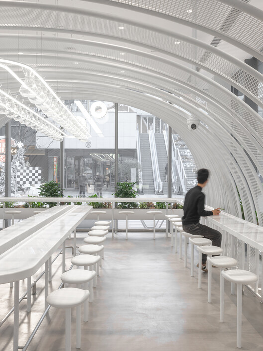 % Arabica Shanghai Expo World / Nguyen Khai Architects & Associates - изображение 7 из 18