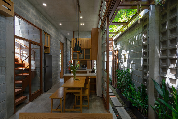 Дом в Binh Duong / Tad.atelier - Интерьерная фотография, дерево