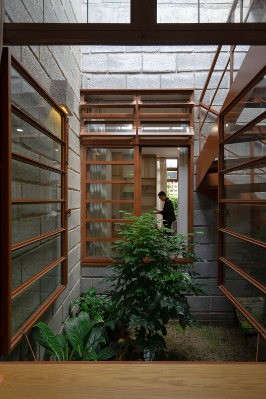 Дом в Binh Duong / Tad.atelier - Интерьерная фотография, дерево