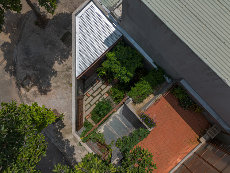 Дом в Binh Duong / Tad.atelier - Внешняя фотография, сад