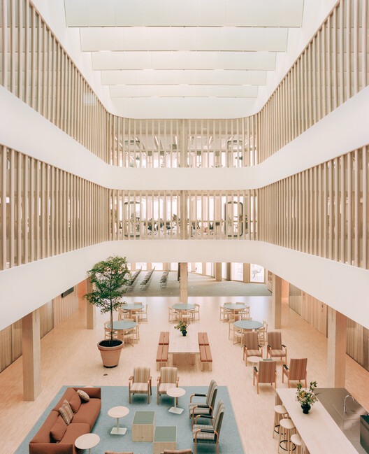 Katajanokan Laituri Wood Office and Hotel Building / Anttinen Oiva Architects - Интерьерная фотография