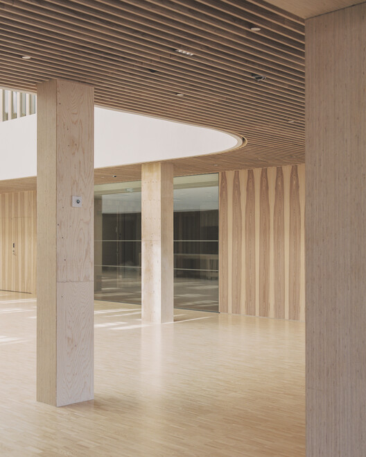 Katajanokan Laituri Wood Office and Hotel Building / Anttinen Oiva Architects - изображение 5 из 27