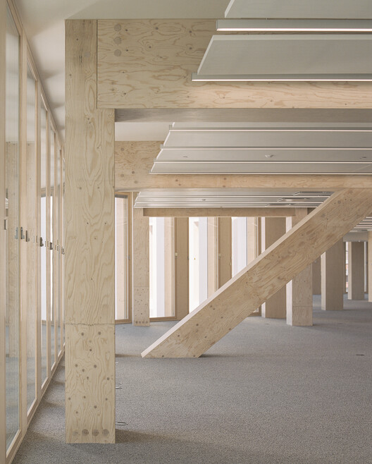 Katajanokan Laituri Wood Office and Hotel Building / Anttinen Oiva Architects - изображение 10 из 27