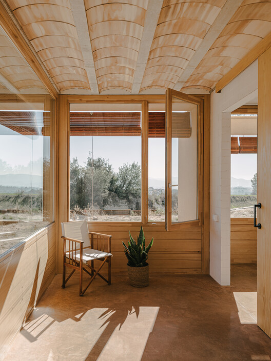 Пассивный дом Lliçà de Vall / Arquitectura Local - Интерьерная фотография, дерево, луч