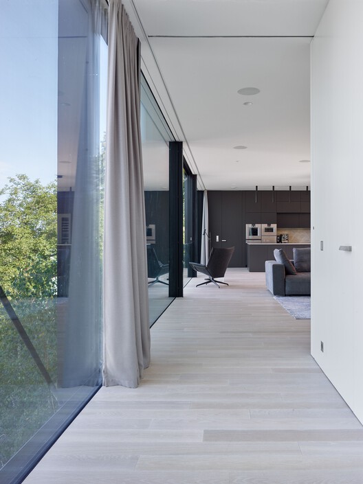 Villa Sidonius / Stempel & Tesar Architekti - Интерьерная фотография, дерево, дверь, стекло