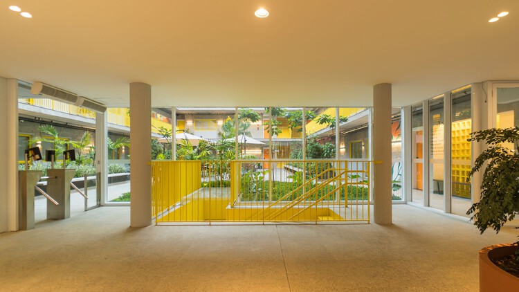 Uliving campinas / branco meio amarelo + isaac safdie arquitetura - изображение 3 из 24