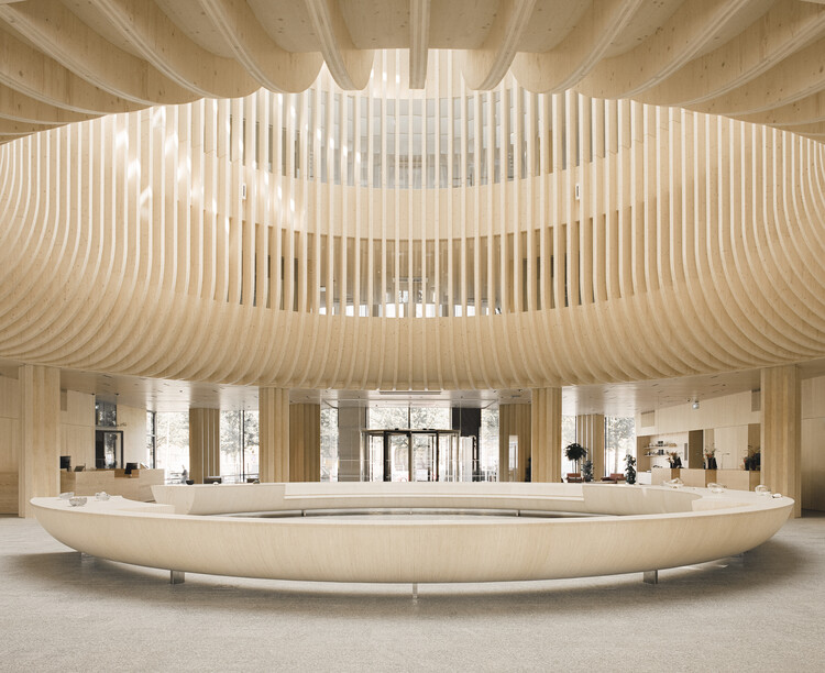 Katajanokan Laituri Wood Office and Hotel Building / Anttinen Oiva Architects - изображение 1 из 27