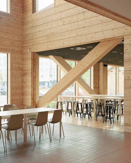 Монио средняя школа и культурный центр / AOR Architects - Интерьерная фотография, столовая, дерево, луч
